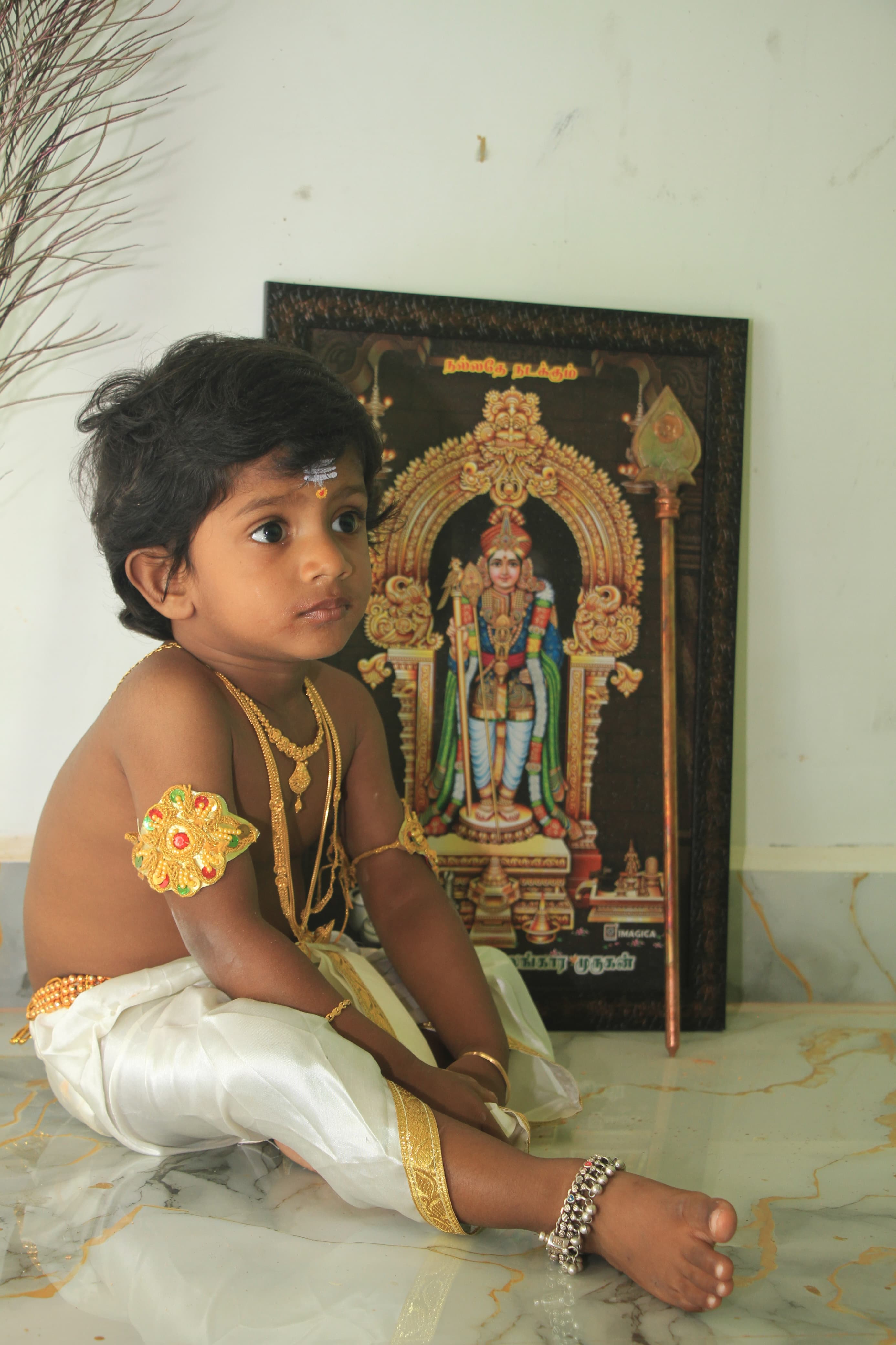 Baby smiling in a floral setup